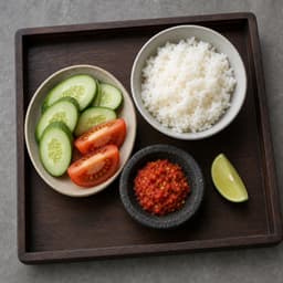 rice, cucumber, tomato, sambal, and lime (nasi, timun, tomat, sambal, dan jeruk limau), 4 servings for Iga Sapi Goreng Madu