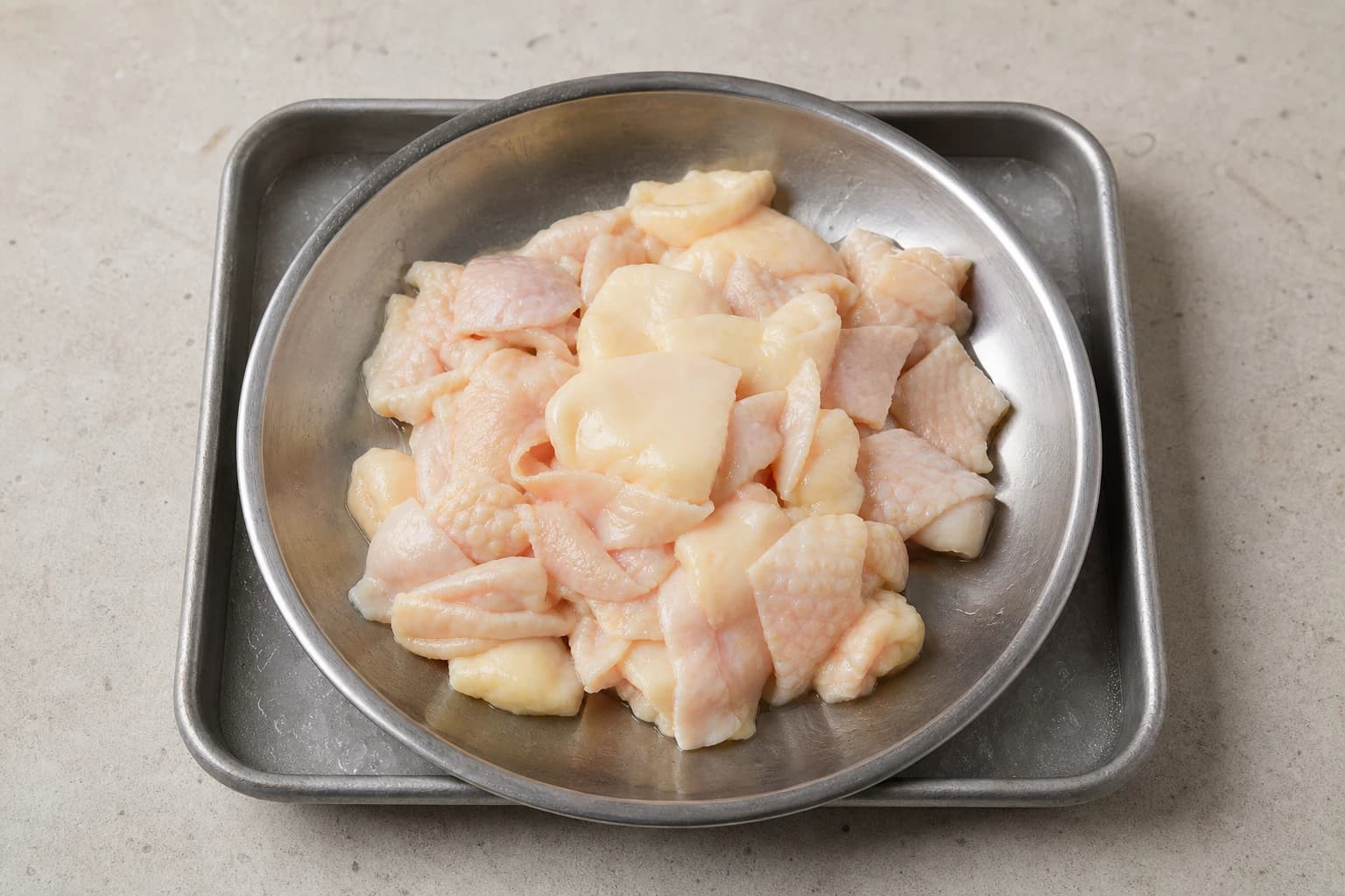 trimmed chicken fat or skin (lemak atau kulit ayam yang dipotong) for Hainanese Chicken Rice