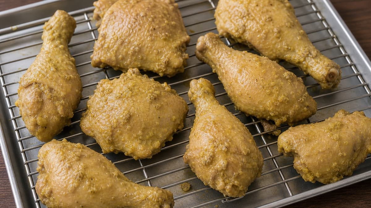 Ayam Goreng Kalasan, step 3, Reserve broth and dry the chicken: Chicken no longer drips; the reserved broth is strained and cool enough not to scramble the egg.