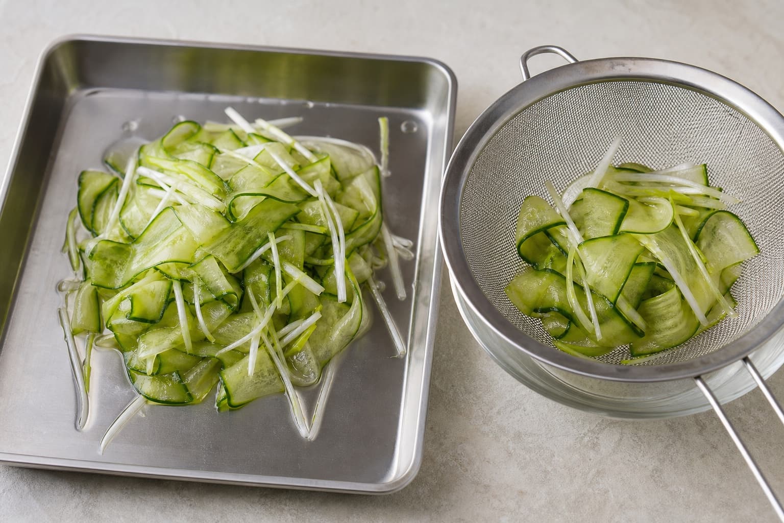 Crisp-Skin Salmon with Miso-Lemon Butter, step 2, Build the cold cucumber contrast: Ribbon edges look lightly translucent but centres still bend with a crisp snap.